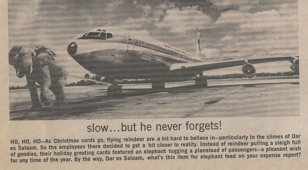 1971, April, An Elephant pulling a Pan Am Boeing 707 in Tanzania.